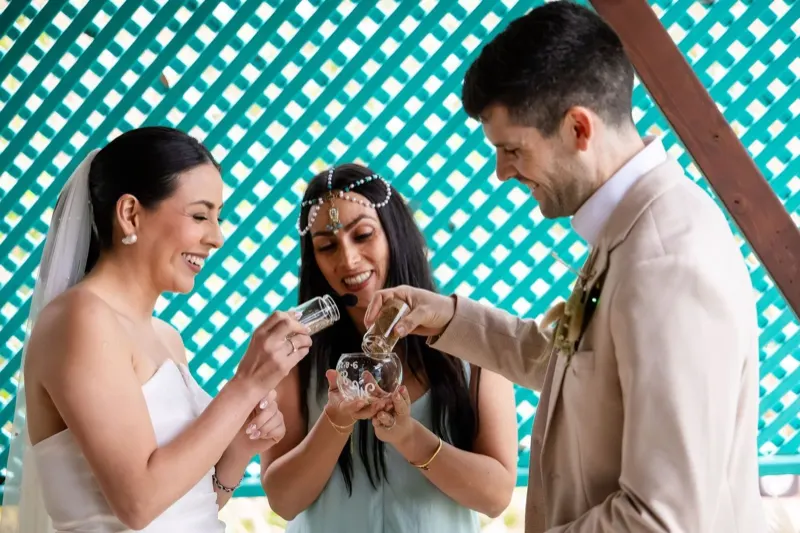 Couple during a sand ceremony at their wedding
